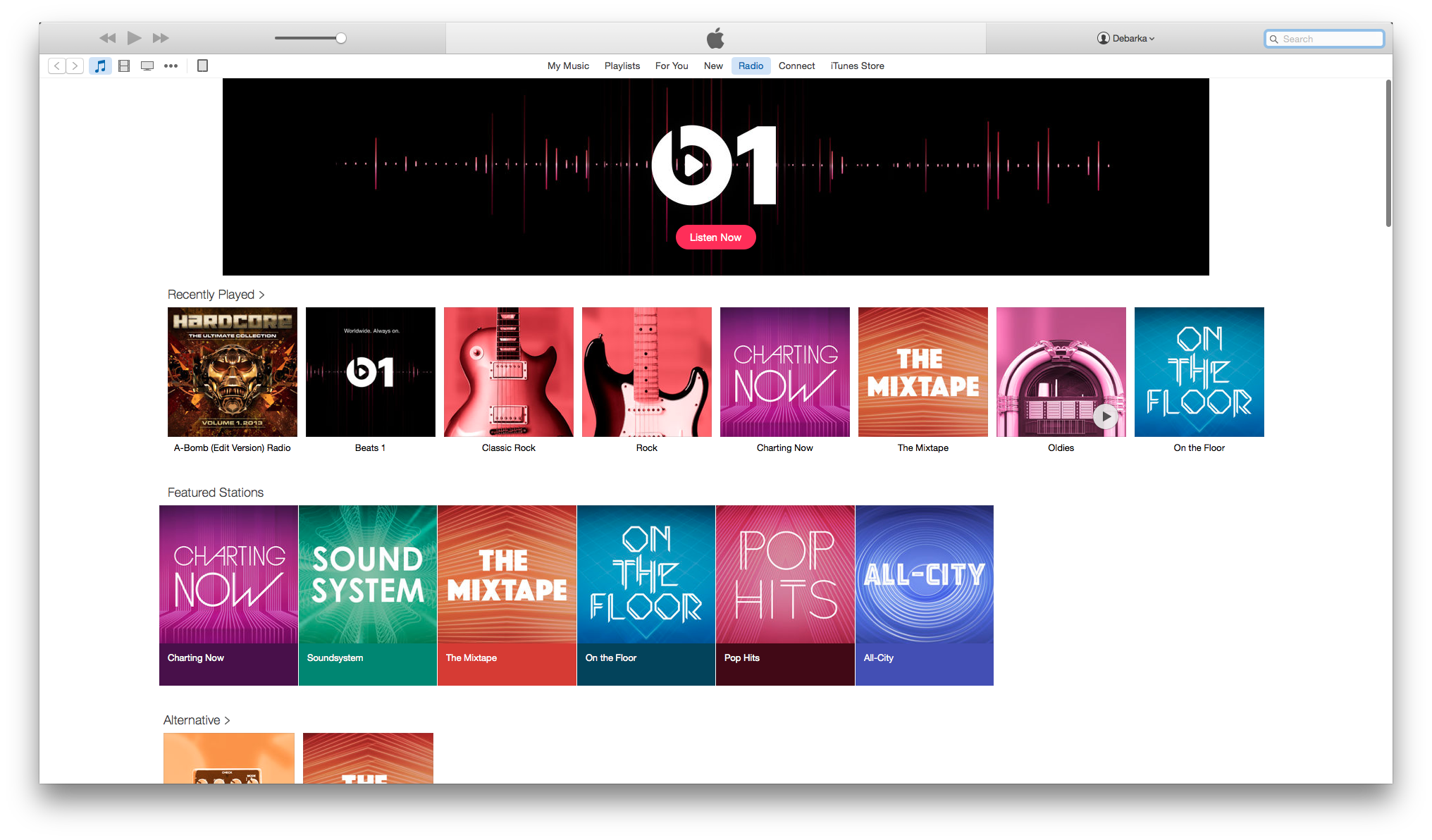 The Radio tab on iTunes showing Beats 1 Radio and other automated playlists based on genre